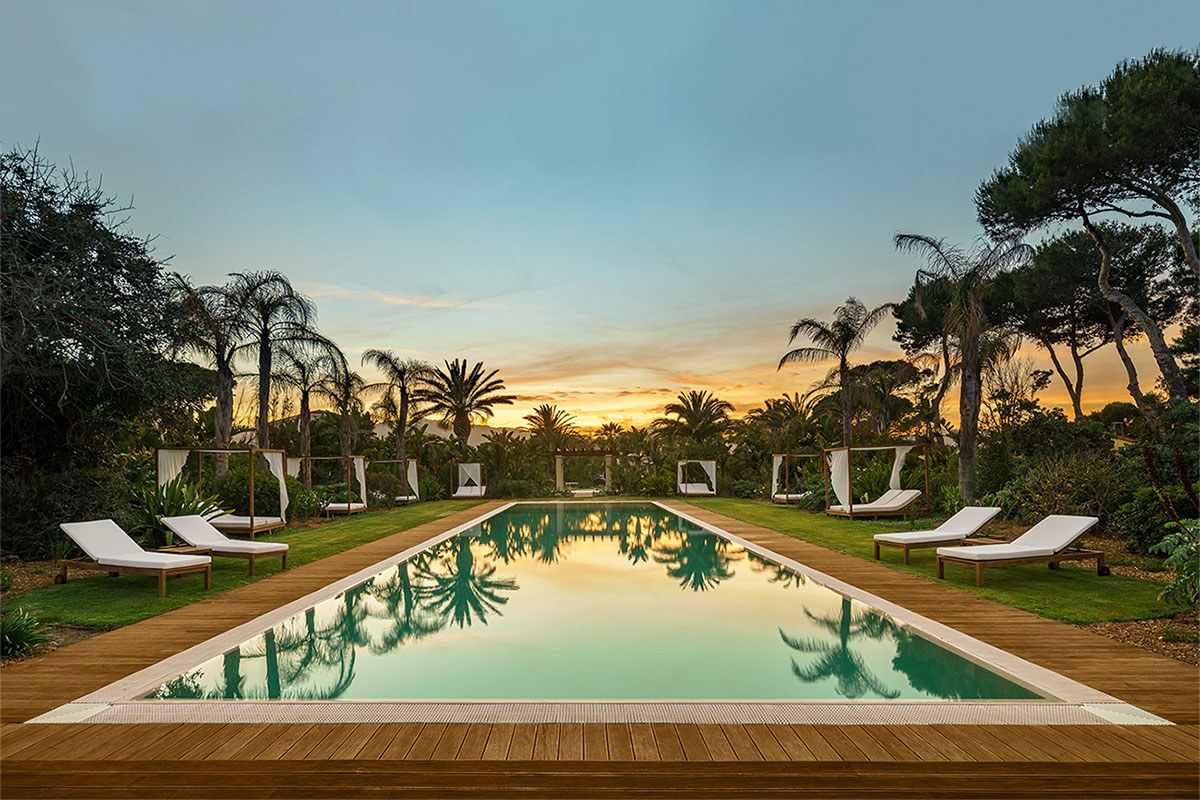 Relaxing pool area and bar at Sant'Efis Luxury Hotel Sardinia